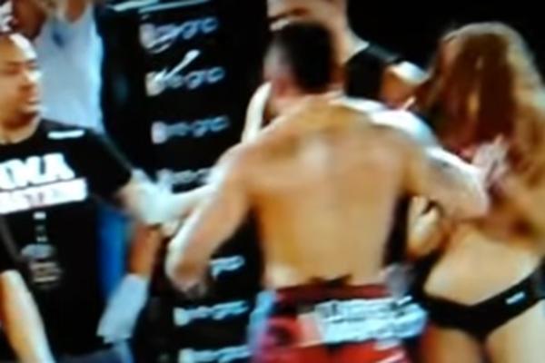 MMA SKANDAL! Ljuti borac posle poraza omazao hostesu o pod! (VIDEO)